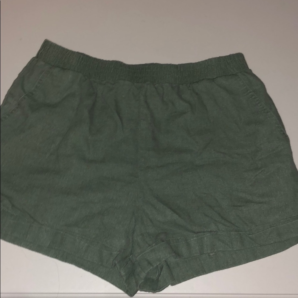 green shorts